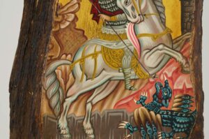 st george slaying the dragon icon hand painted on old wood